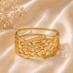 Elegant Gold Cutwork Statement Bracelet