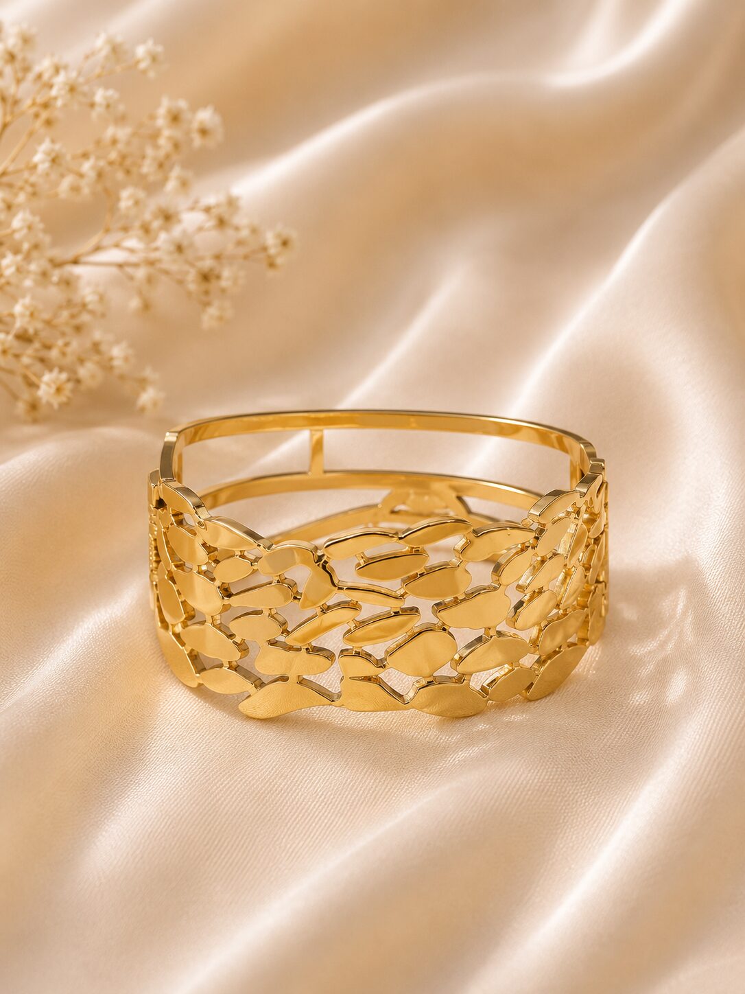 2026/07/1000729587.jpg Elegant Gold Cutwork Statement Bracelet - Image 1