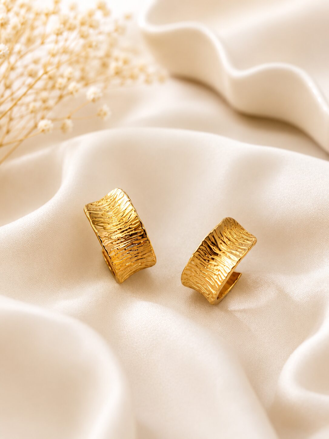 2026/07/1003577438.jpg Gold Textured Curved Hoop Earrings for Women | Trendy Statement Fashion Earrings | LAADDO - Image 1
