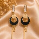 White Enamel Crystal Drop Earrings with Gold-Tone Tassel Design