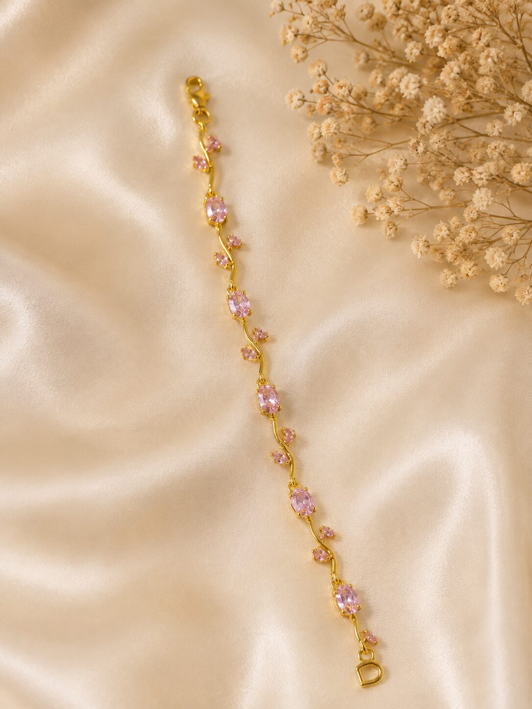 2026/08/1000731612.jpg Elegant Gold-Tone Pink Crystal Vine Bracelet - Image 1
