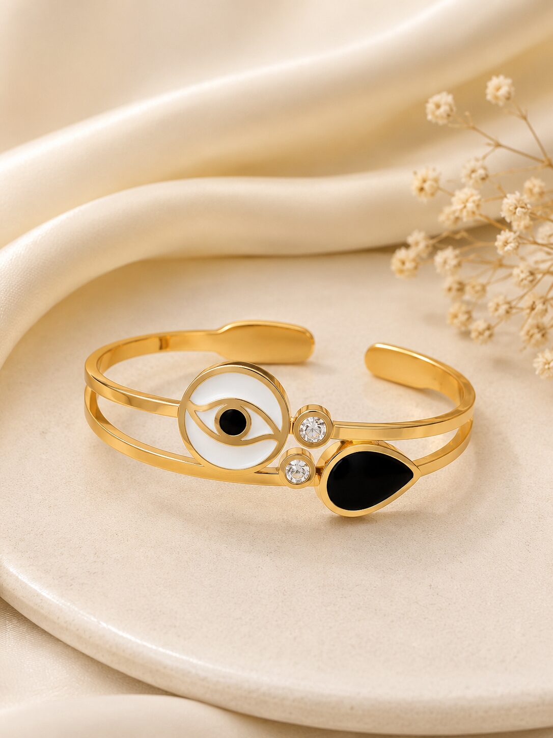2026/08/1001772966.jpg Premium Gold Evil Eye & Black Stone Open Cuff Bracelet - Image 1