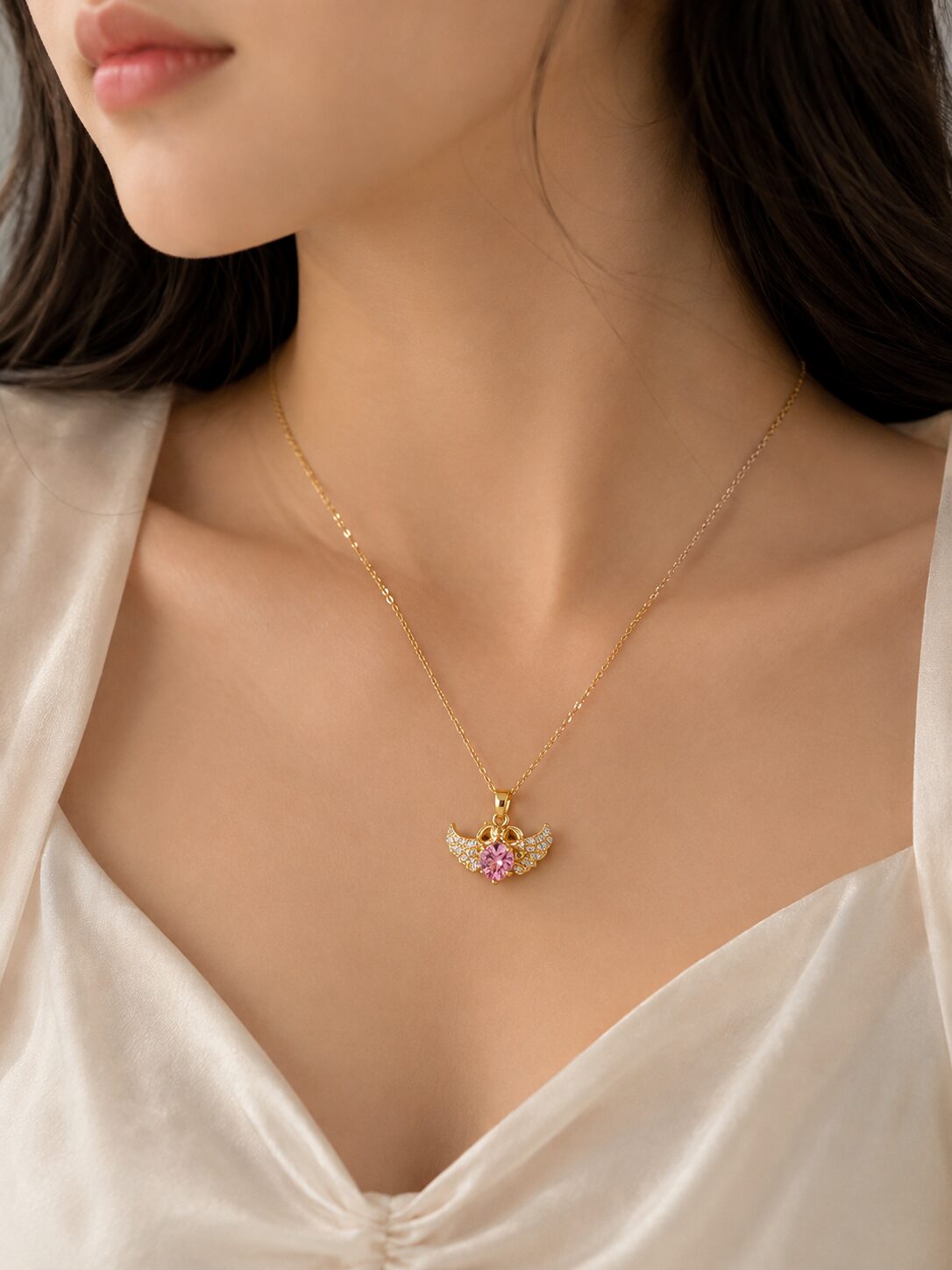 2026/08/1001773034.jpg Elegant Pink Gemstone Wing Pendant Necklace - Image 1