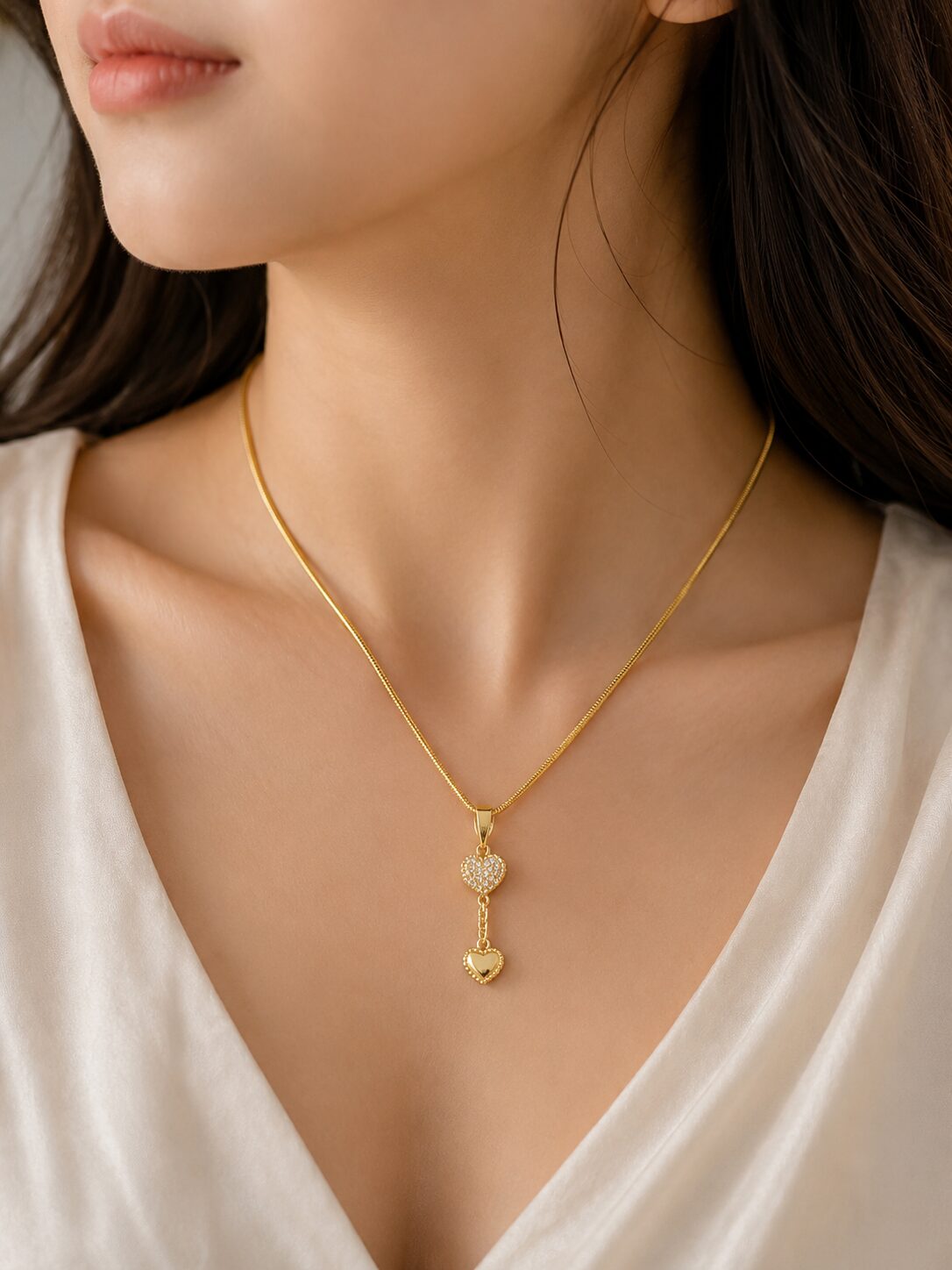 2026/08/1001773041.jpg Elegant Gold Double Heart Pendant Necklace - Image 1
