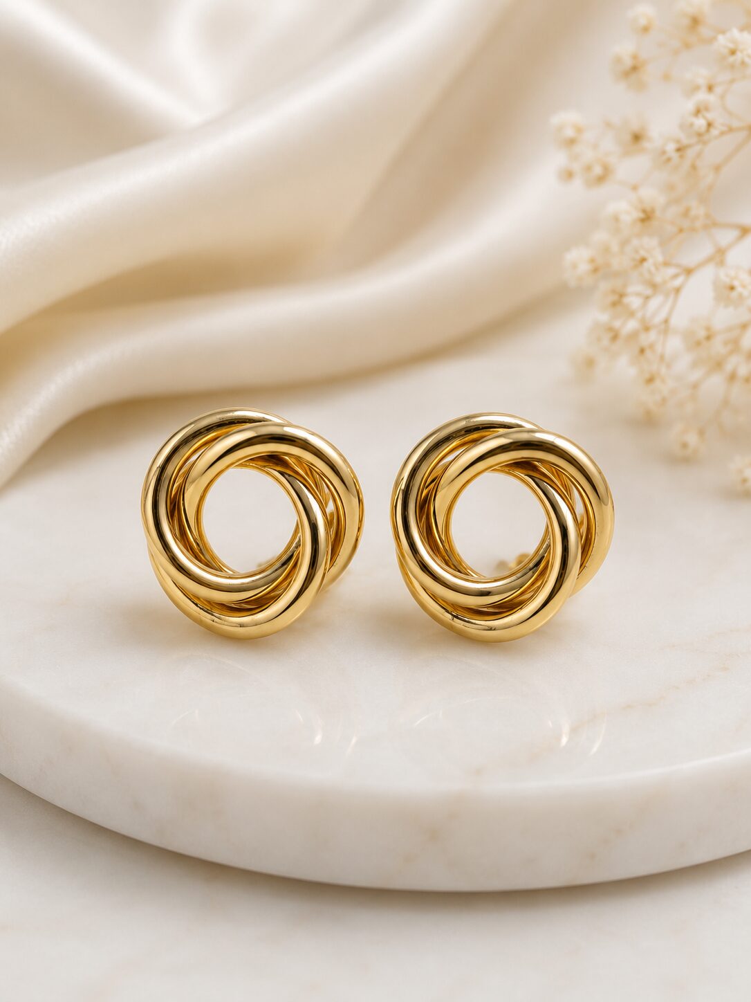2026/08/1001777338.jpg Premium Gold Interlocking Knot Stud Earrings | Elegant Fashion Jewellery - Image 1