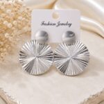 Silver Sunburst Disc Statement Earrings