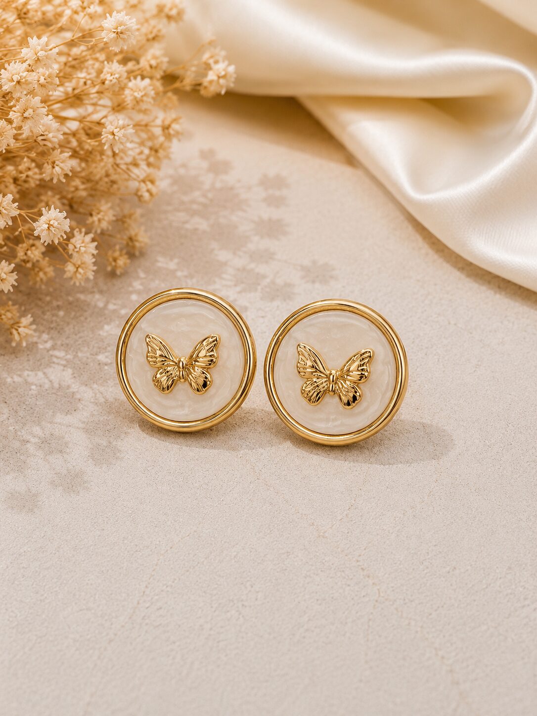 2026/08/1001777496.jpg Cream Pearl Butterfly Stainless Steel Stud Earrings - Image 1