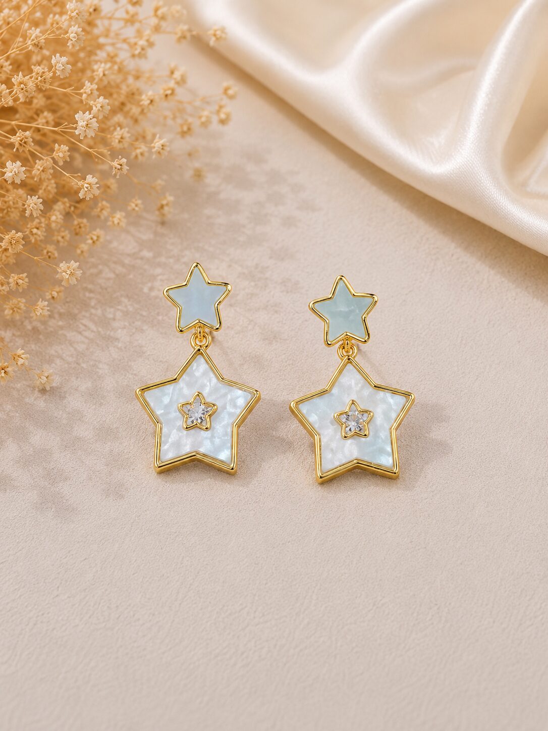 2026/08/1001777516.jpg Elegant Star Drop Earrings with Pearl Finish - Image 1