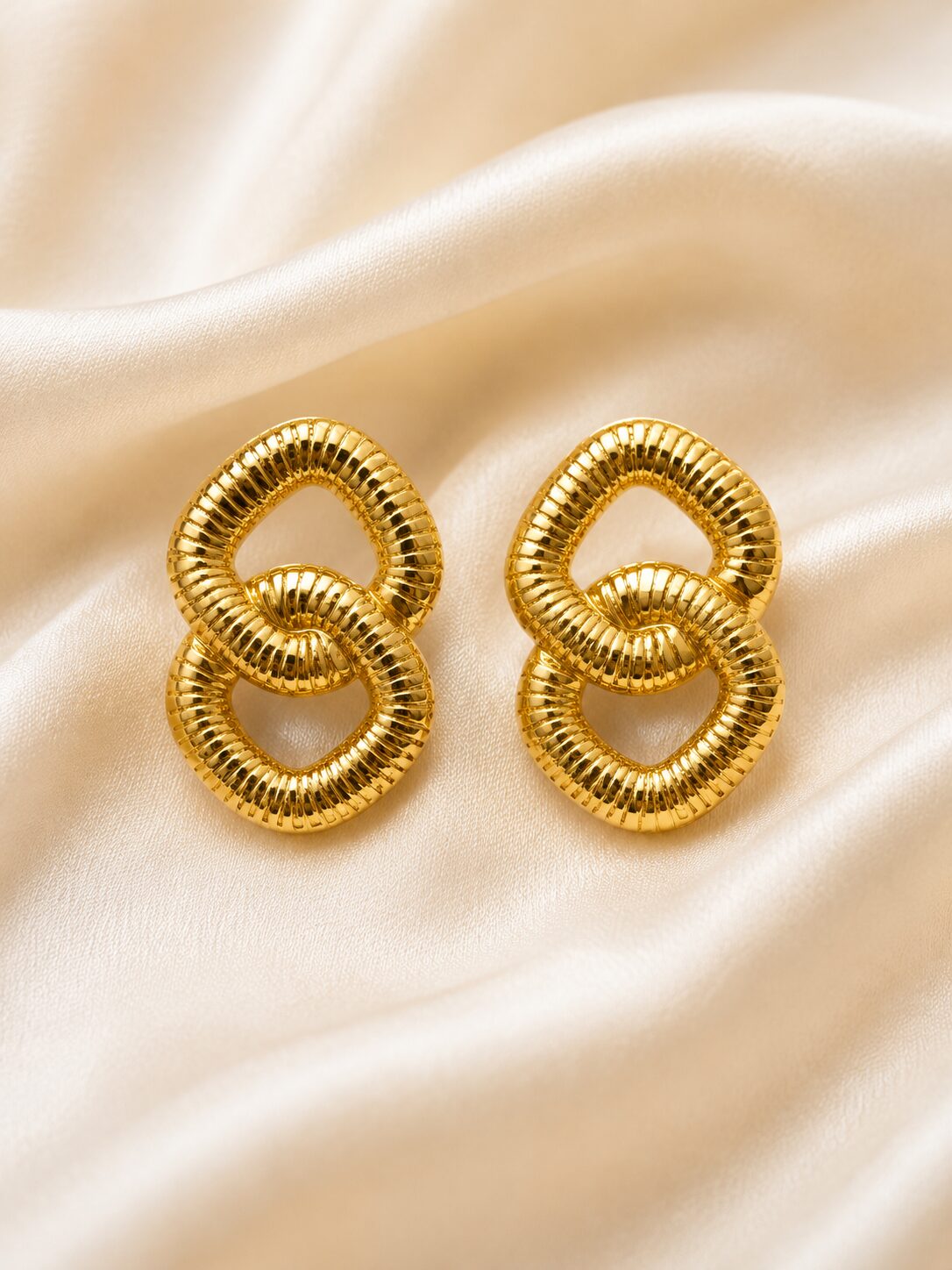 2026/08/1001779807.jpg Premium Stainless Steel Interlocking Hoop Earrings - Image 1