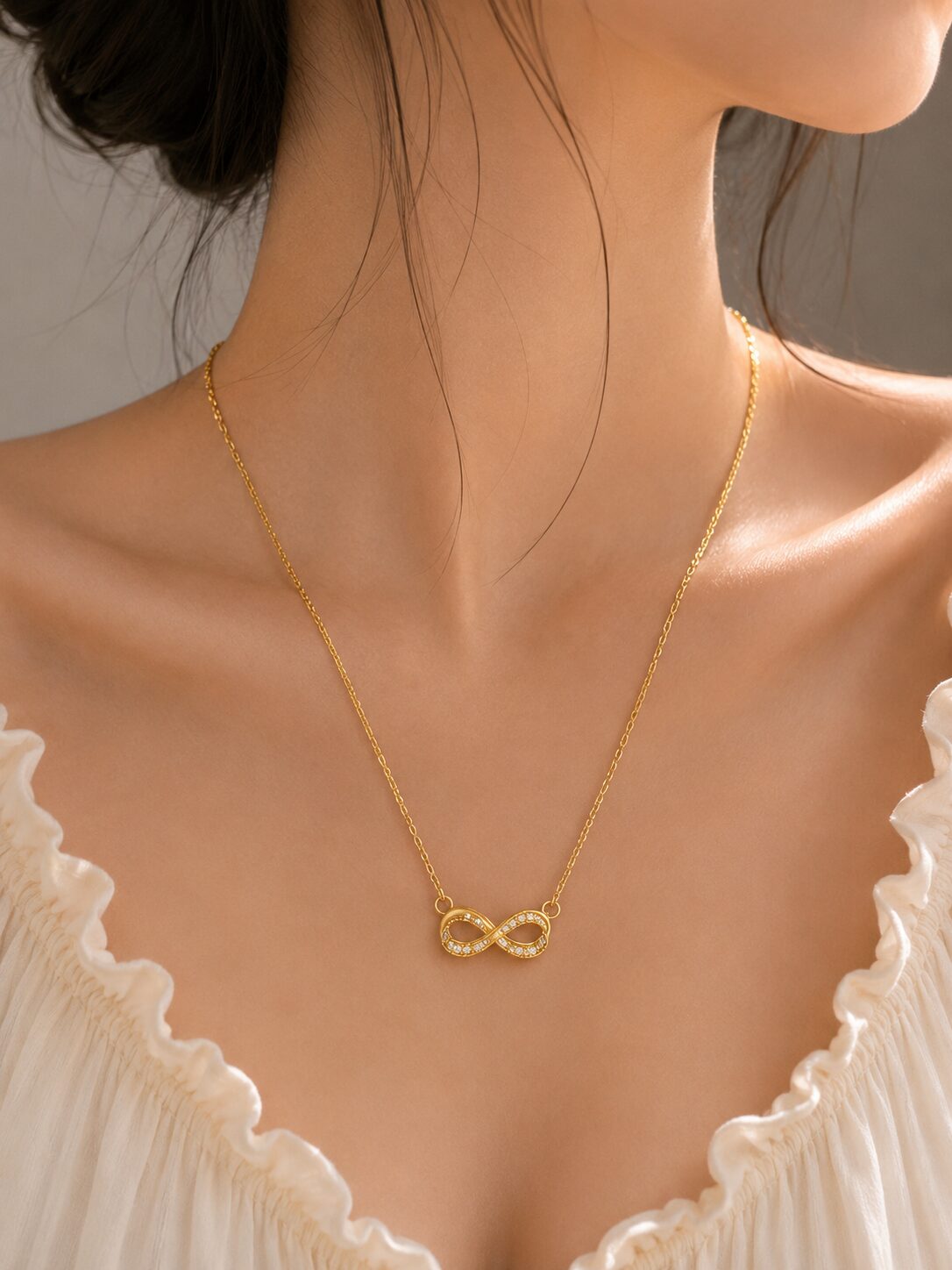 2026/08/1001780447.jpg Elegant Gold Infinity Crystal Necklace - Image 1