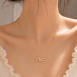 Elegant Gold Bow Pink Crystal Necklace
