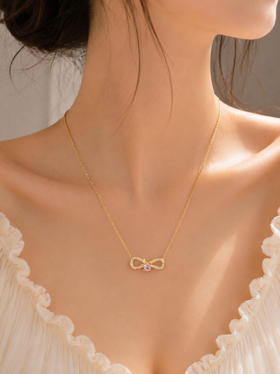 2026/08/1001780449.jpg Elegant Gold Bow Pink Crystal Necklace - Image 1