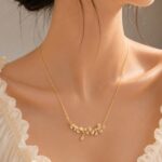 Elegant Gold Leaf Crystal Necklace