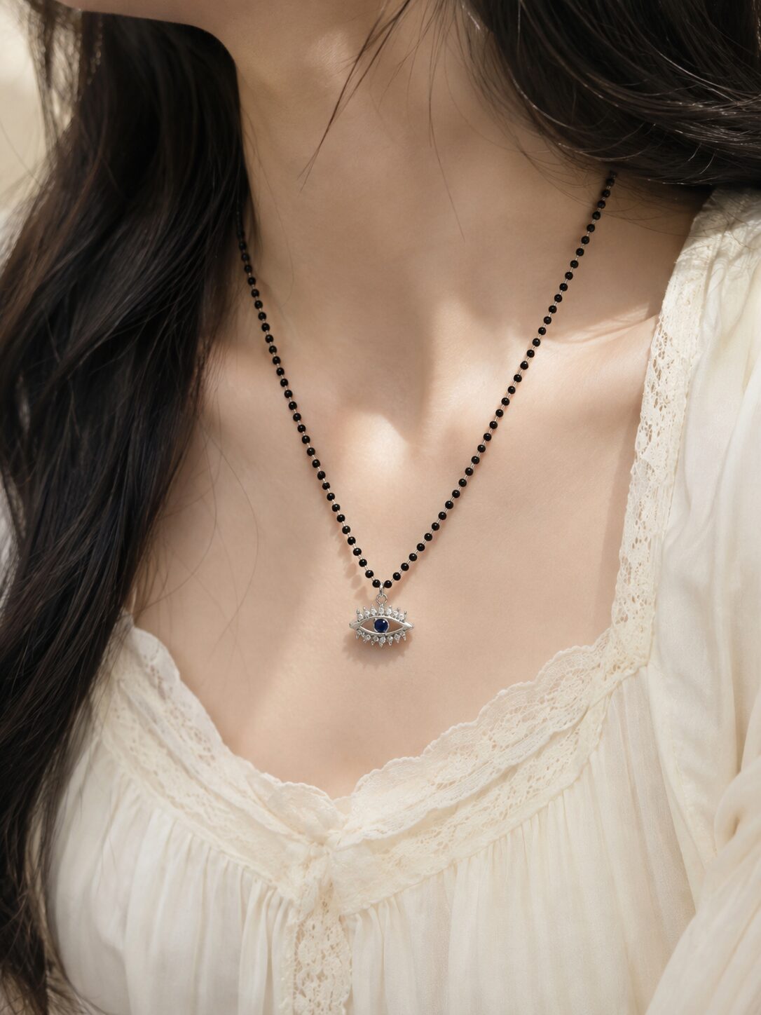 2026/08/1001780744.jpg Elegant Black Beaded Evil Eye Mangalsutra - Image 1