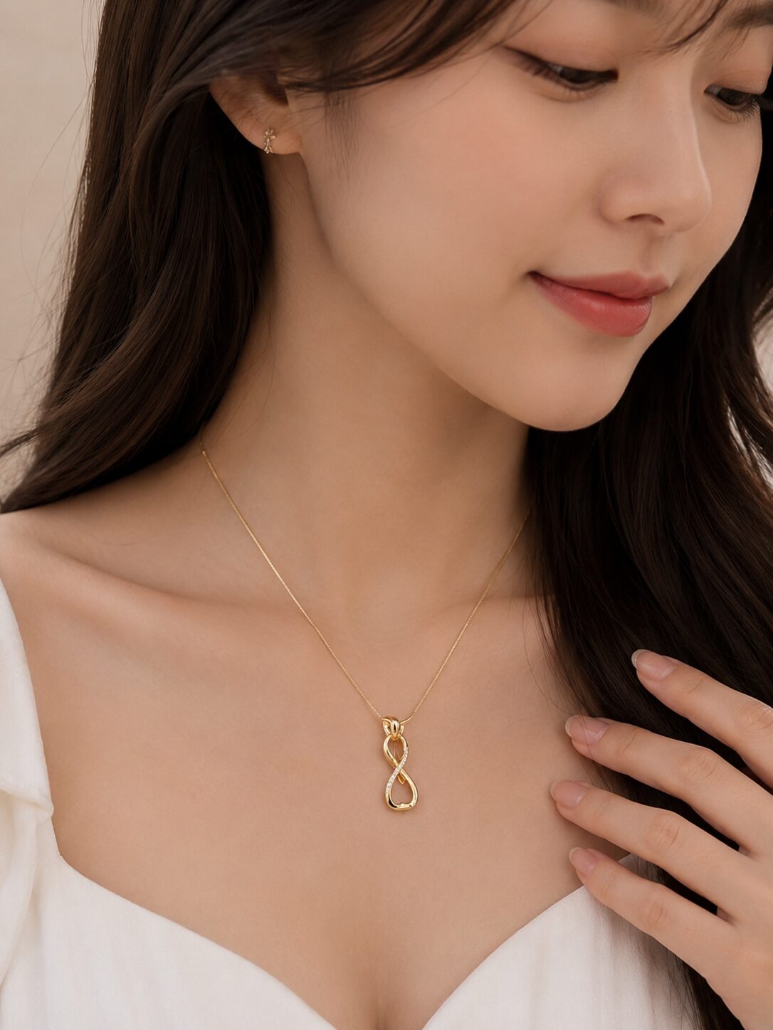 2026/08/1003578065.jpg Elegant Infinity Loop Gold Pendant Necklace - Image 1
