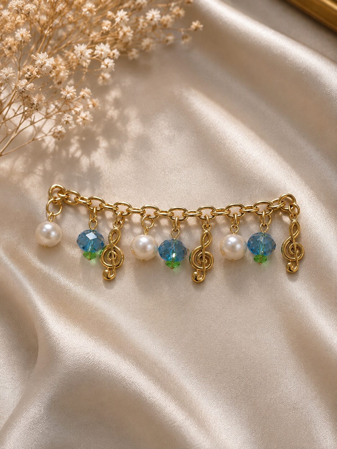 2026/08/1003579574.jpg Elegant Blue Crystal & Pearl Musical Charm Bracelet ✨ - Image 1