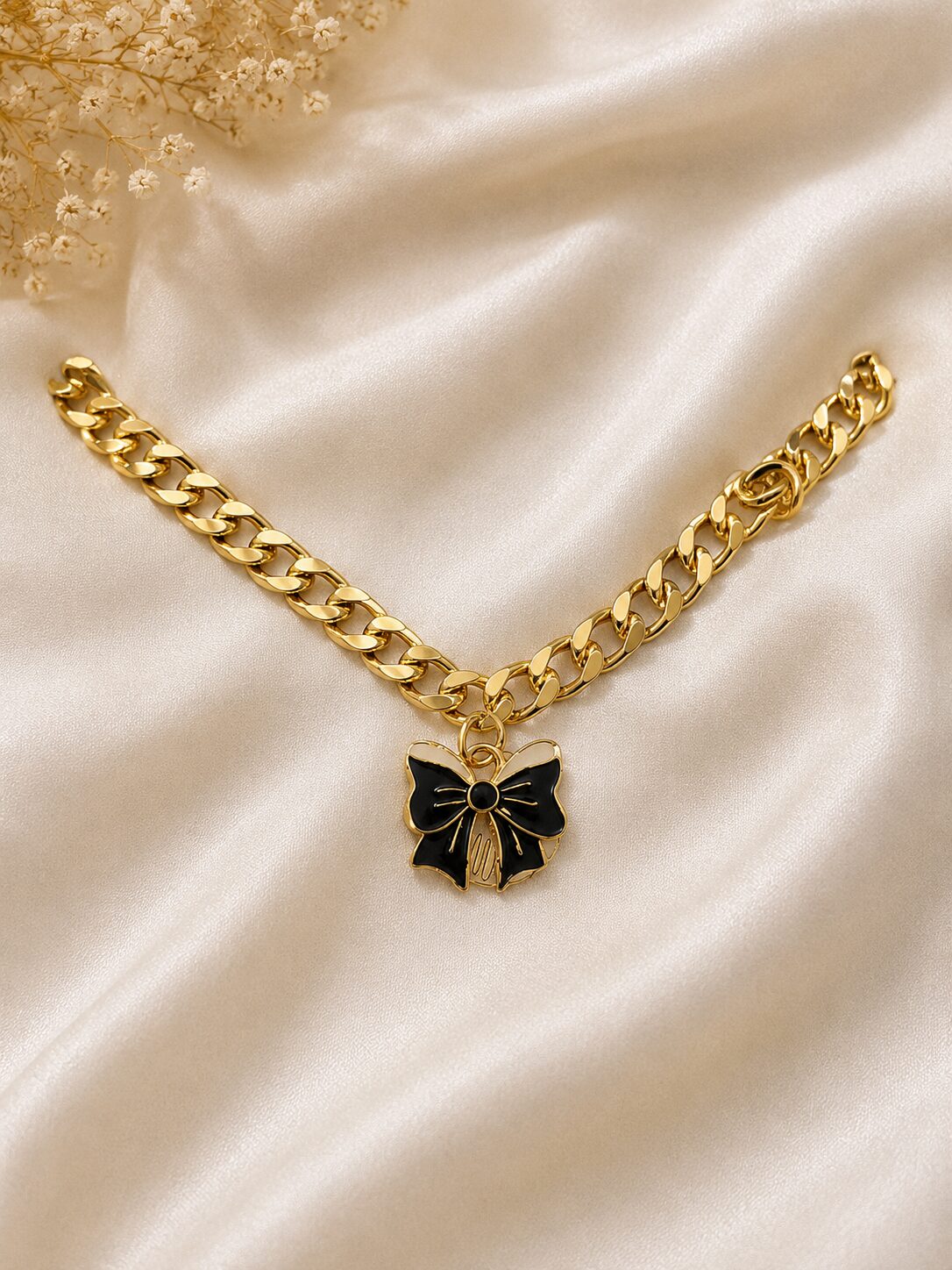 2026/08/1003579624.jpg Black Bow Charm Gold Chain Bracelet - Image 1