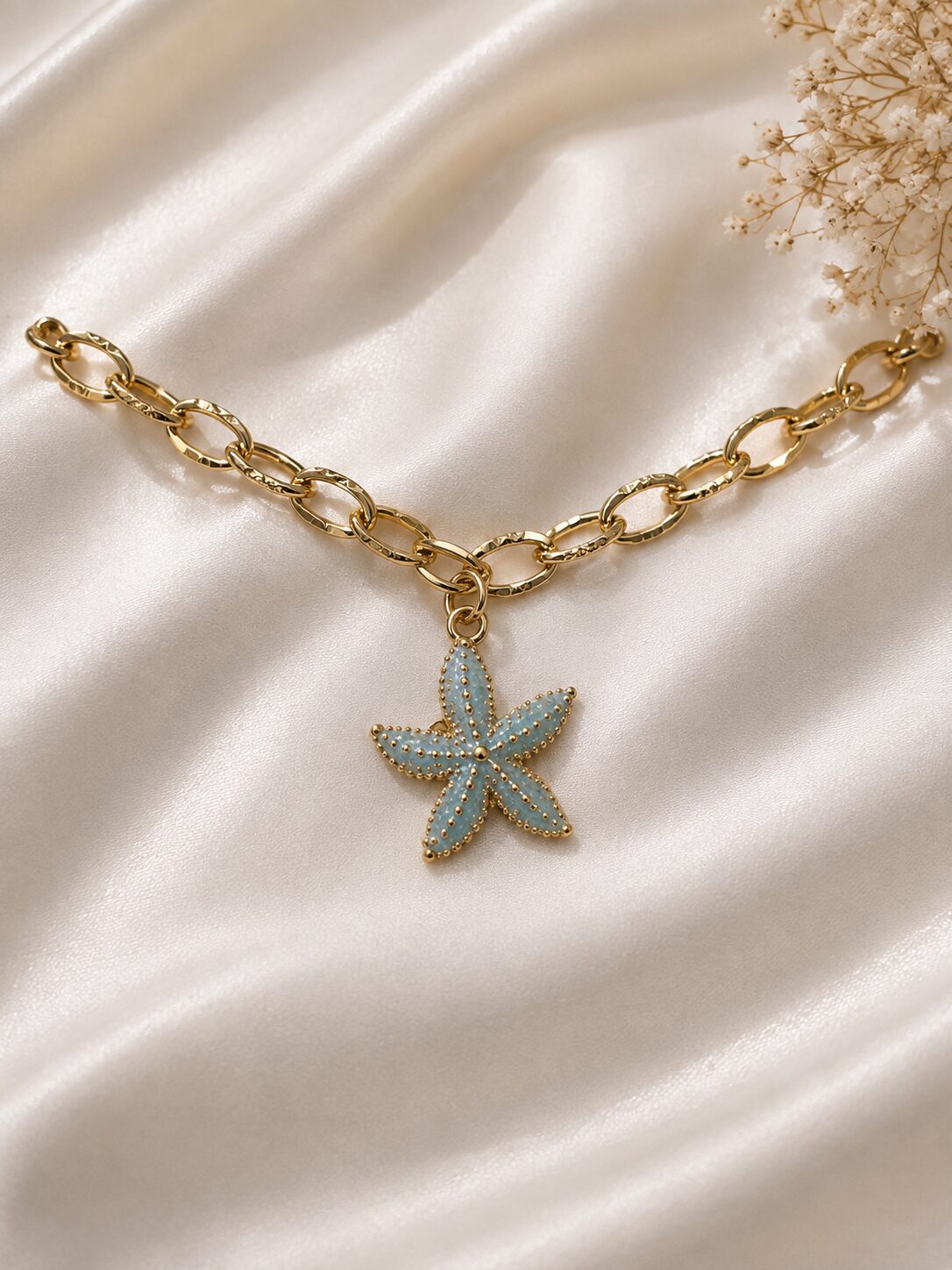 2026/08/1003579640.jpg Blue Starfish Charm Gold Chain Bracelet - Image 1