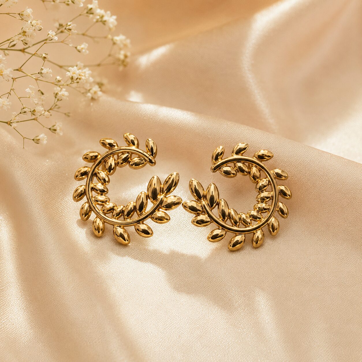 2026/08/17718.jpg Golden Leaf Wreath Statement Hoop Earrings - Image 1