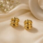 Golden Sculpted Wave Stud Earrings