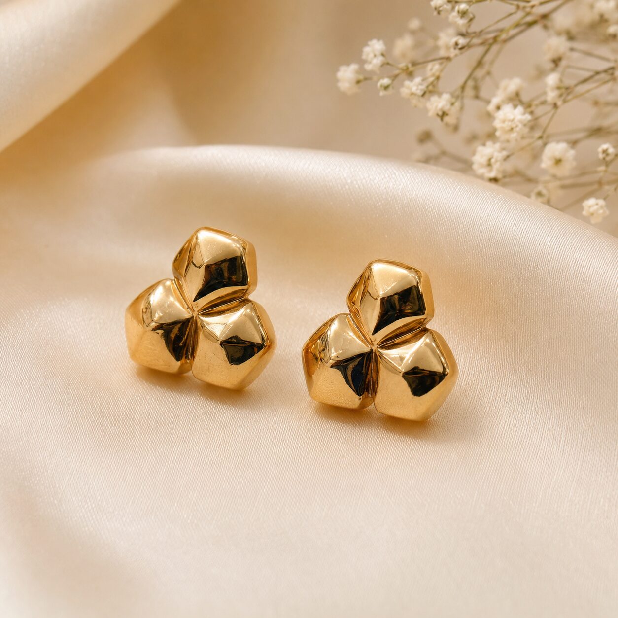 2026/08/17867.jpg Golden Geometric Flower Stud Earrings - Image 1