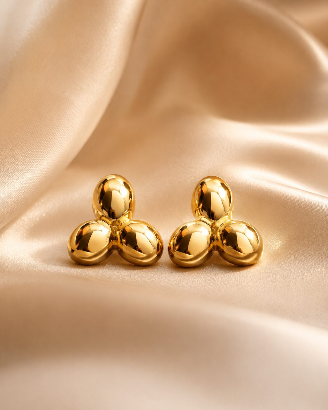 2026/08/18198.jpg Glossy Gold Three-Petal Cluster Stud Earrings - Image 1