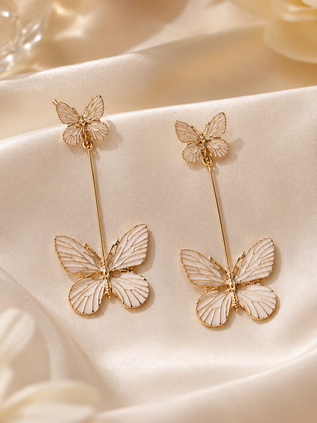2026/08/18203-1.jpg Ivory Enamel Butterfly Long Drop Earrings - Image 1