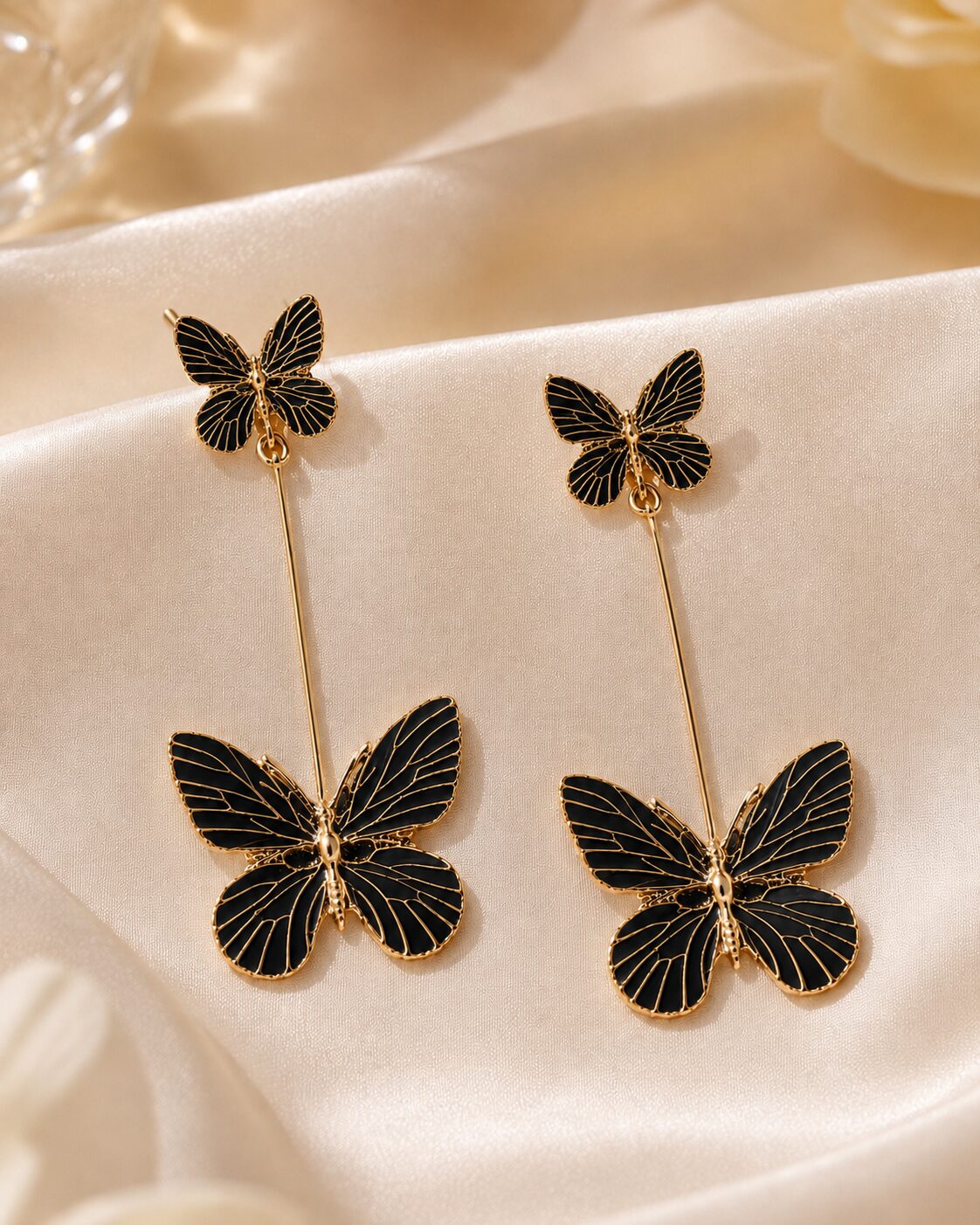2026/08/18238.jpg Black Butterfly Long Drop Earrings with Golden Detailing - Image 1