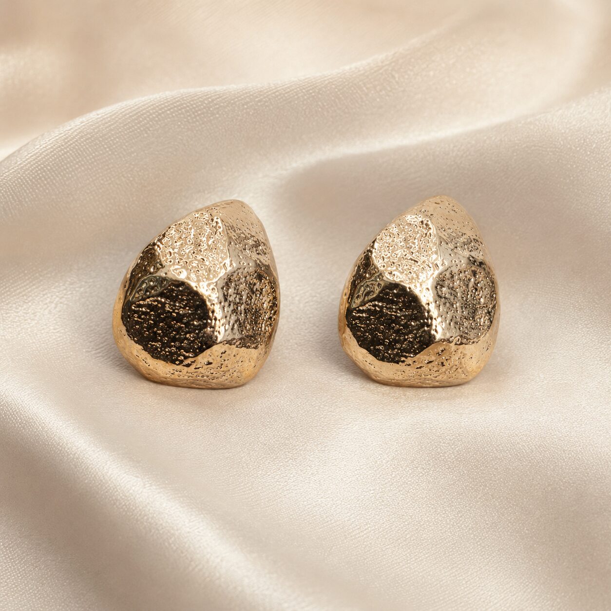 2026/08/18339.jpg Textured Pebble Gold Stud Earrings - Image 1