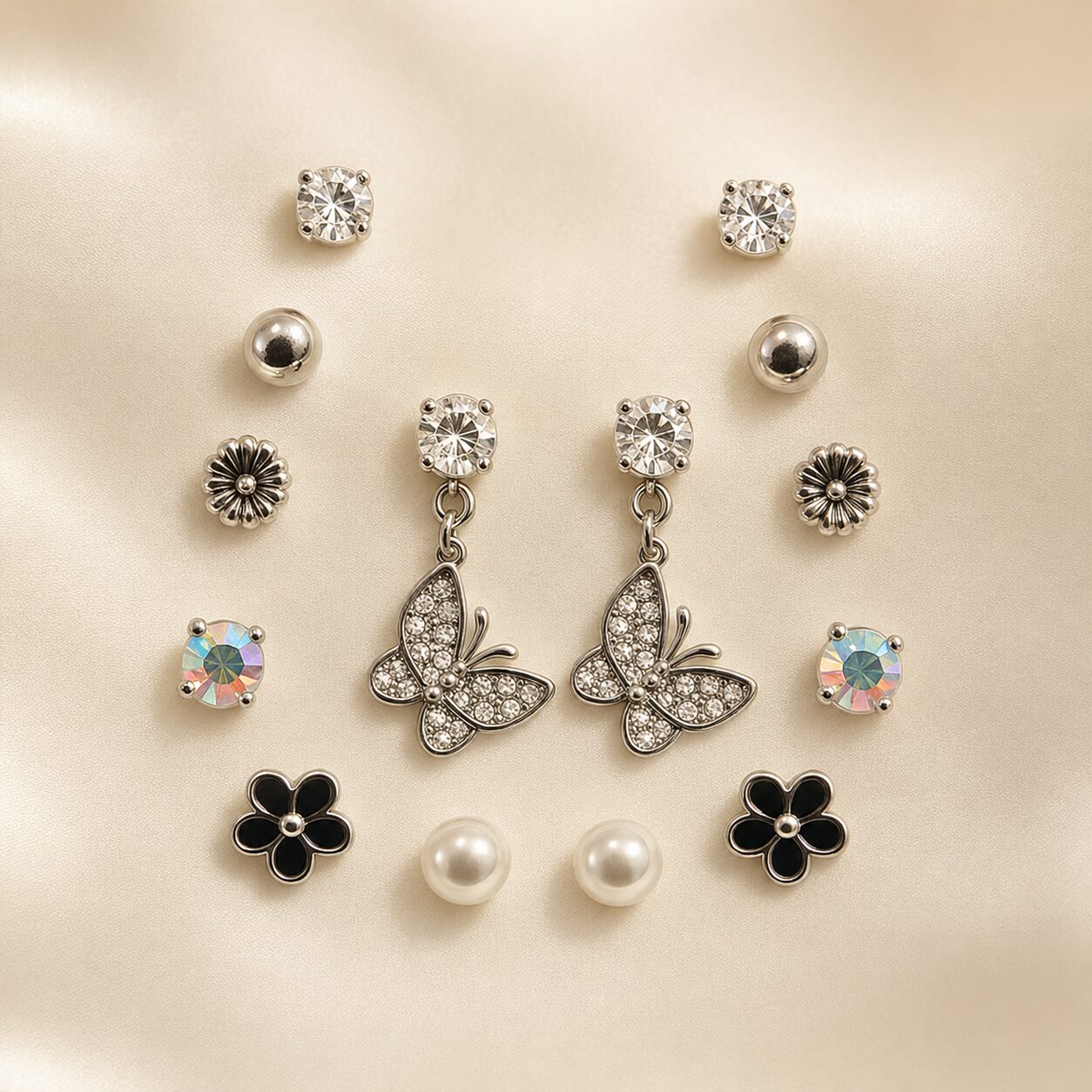 2026/08/18345.jpg Silver Butterfly 7-Pair Korean Stud Earrings Combo Set - Image 1