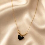 Black Heart Golden Beaded Pendant Necklace