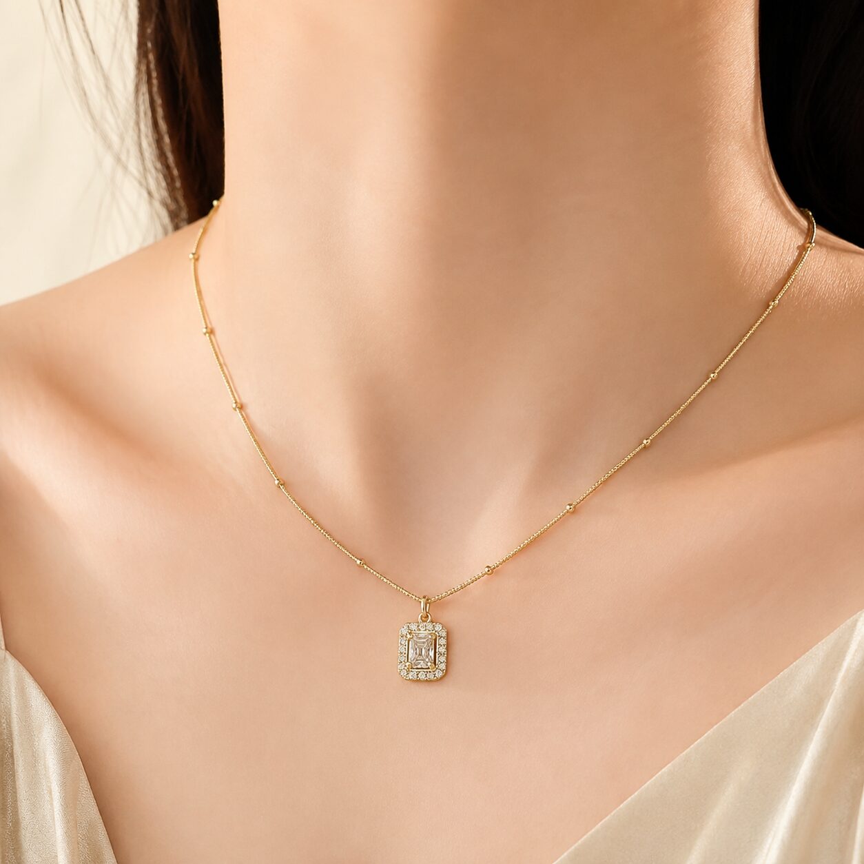 2026/08/26131.jpg Emerald-Cut Crystal Double Halo Gold-Tone Necklace - Image 1