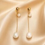Premium pearl-drop earrings photoshoot created. ✨