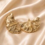 Gold ginkgo leaf statement earrings