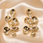 Premium double-flower pearl-and-crystal earrings photo created.
