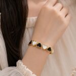 Elegant Black & White Heart Gold
 Cuff Bracelet 🖤🤍✨