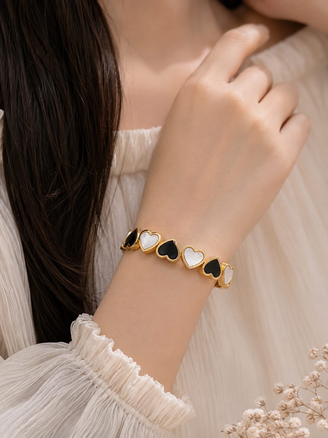 2026/09/1001782777-1.jpg Elegant Black & White Heart Gold
Cuff Bracelet 🖤🤍✨ - Image 1