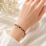Elegant Black & Gold Vine Bracelet
