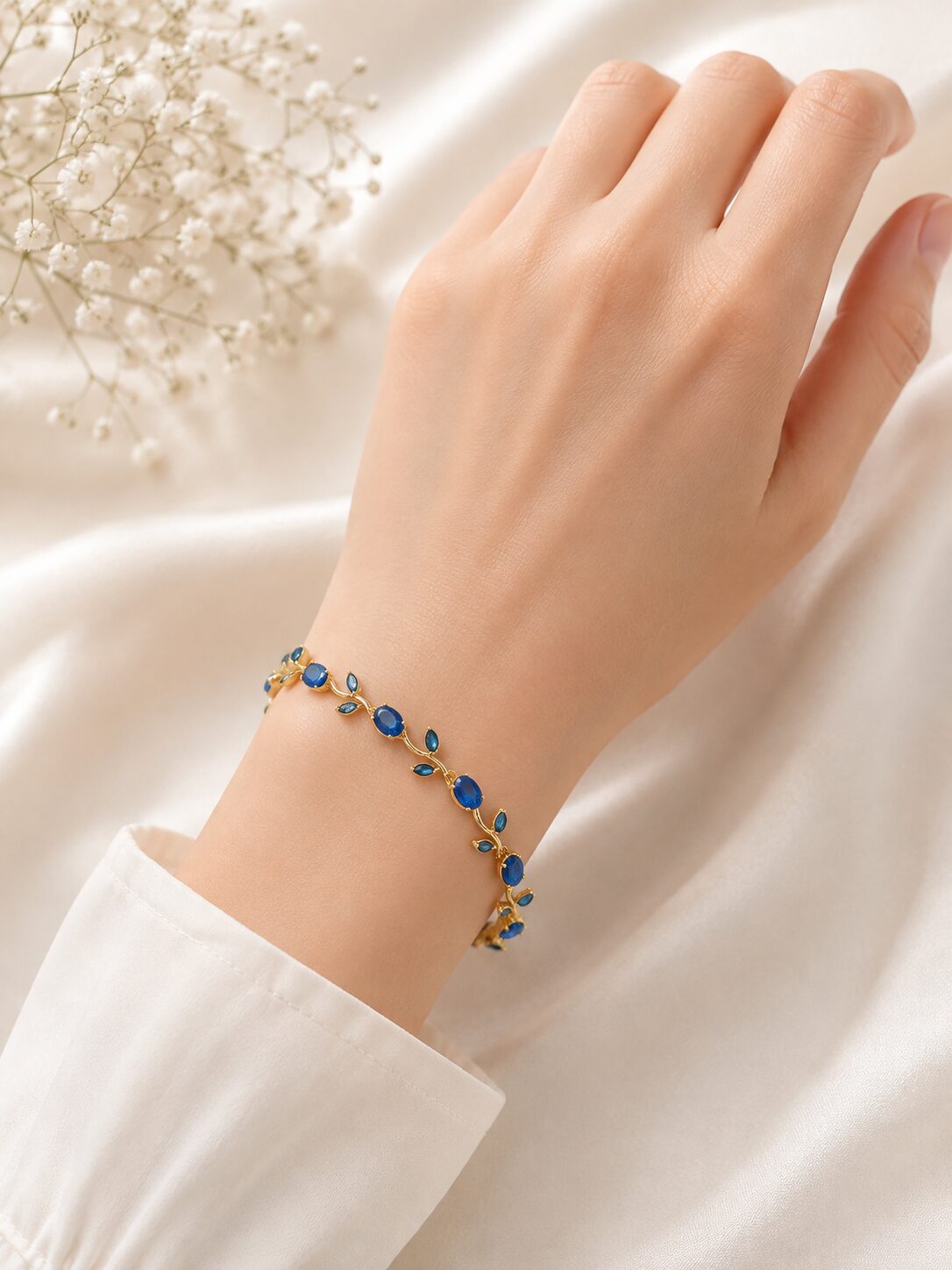 2026/09/1001782881.jpg Elegant Blue Sapphire Vine Bracelet - Image 1