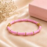 Elegant Pink & Gold Bamboo Style Bracelet