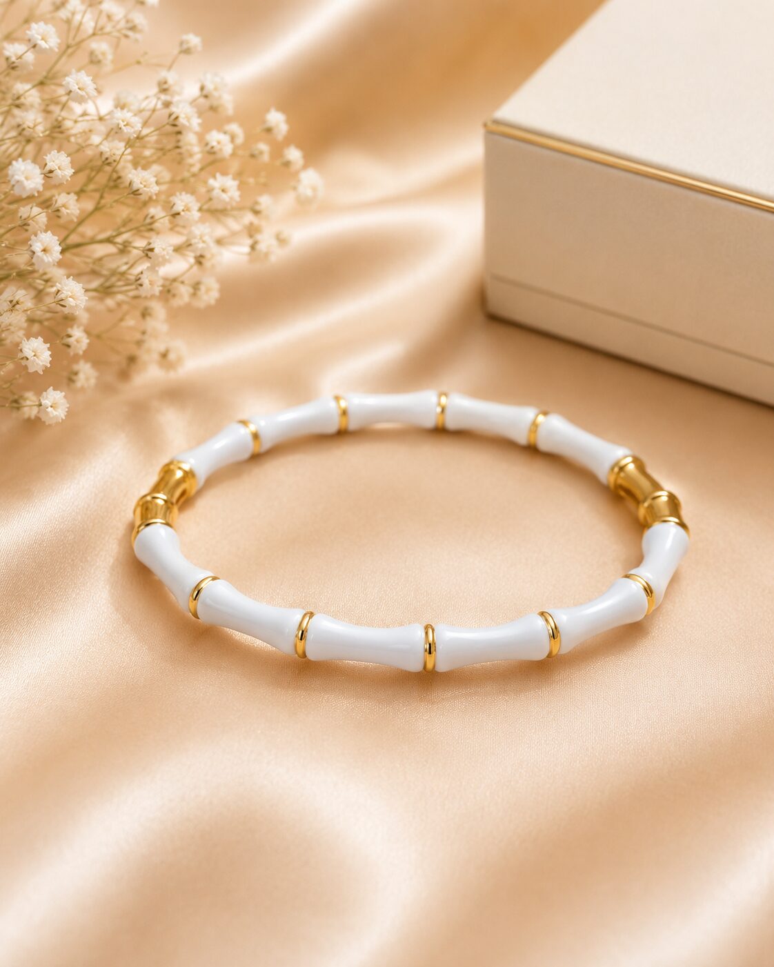 2026/09/1001782924.jpg Elegant White & Gold Bamboo Style Bracelet - Image 1
