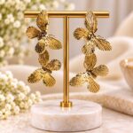 Elegant Gold Floral Drop Earrings – Textured Petal Long Dangle Party Wear Jewellery