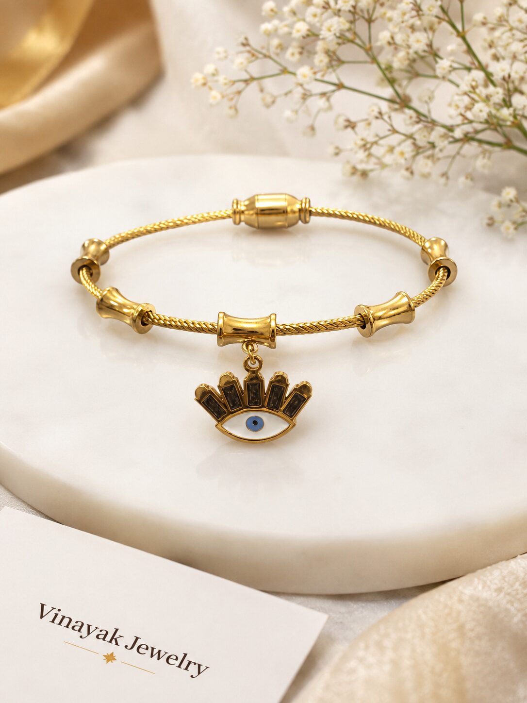 2026/09/1003579802.jpg Golden Evil Eye Charm Bracelet - Image 1