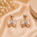 Elegant Rose Gold Pearl Bow Earrings
