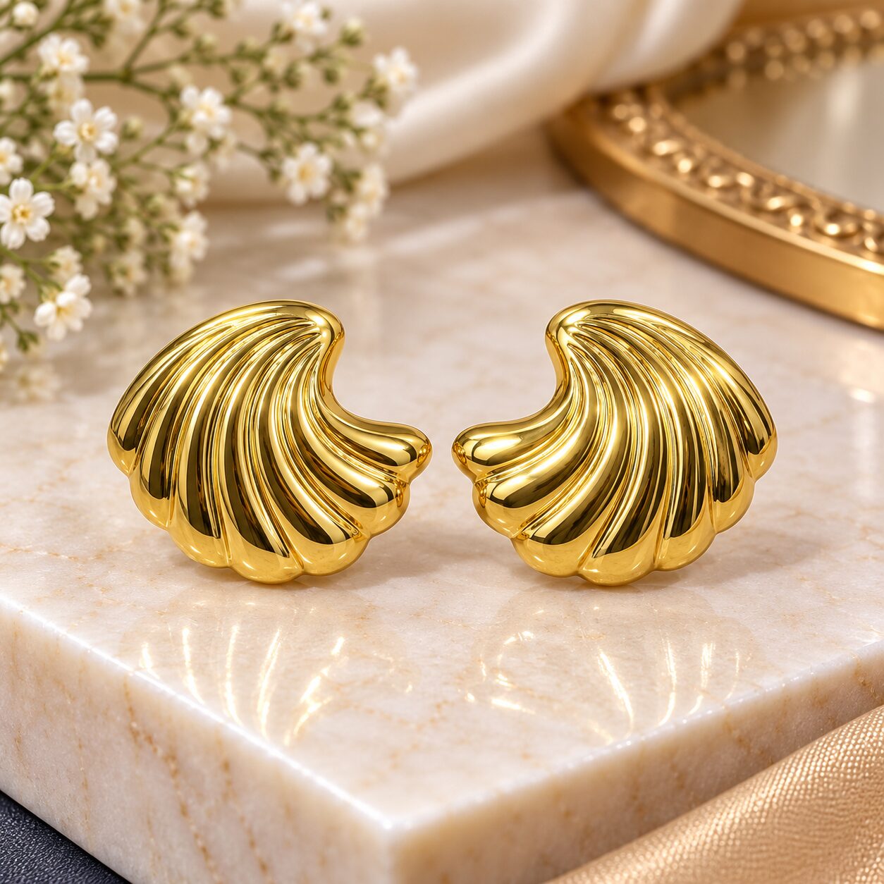 2026/09/1003580211.jpg Elegant Golden Shell Statement Earrings - Image 1