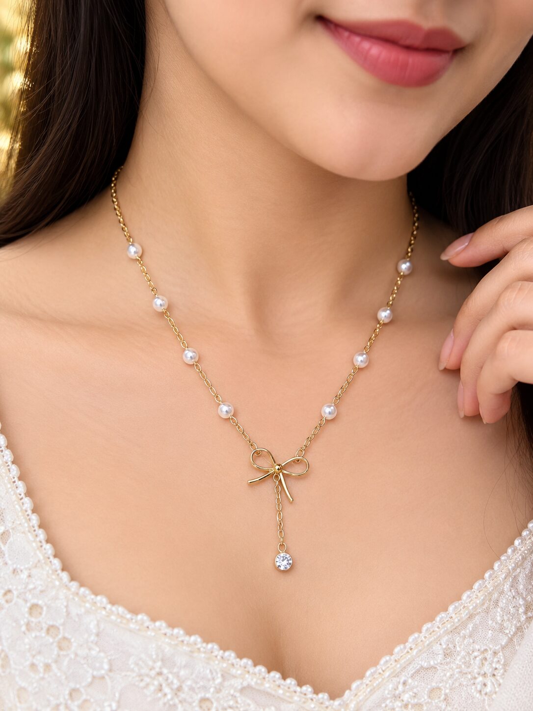 2026/09/1003580309.jpg Elegant Pearl Bow Necklace - Image 1