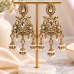 Antique Gold Peacock Design Jhumka Earrings with Pearl & Stone Detailing