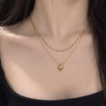 “Elegant Double-Layer Heart Necklace ✨💛”