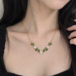 Emerald Leaf Crystal Necklace – Elegant Gold-Tone Statement Jewellery