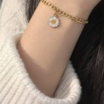 “Daisy Charm Bracelet 🌼✨”